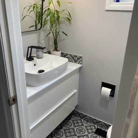 Compact airdrie bathroom layout with walk in shower and floating vanity